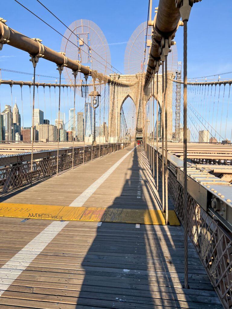 Brooklyn Bridge Pedestrian Walkway with the New York City skyline in the background