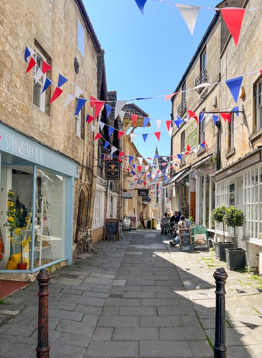 Street view of The Shambles in Bradford-on-Avon, a small town in England perfect for exploring local coffee shops, foodie spots, and historic buildings